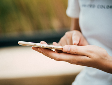 Side view of user holding phone